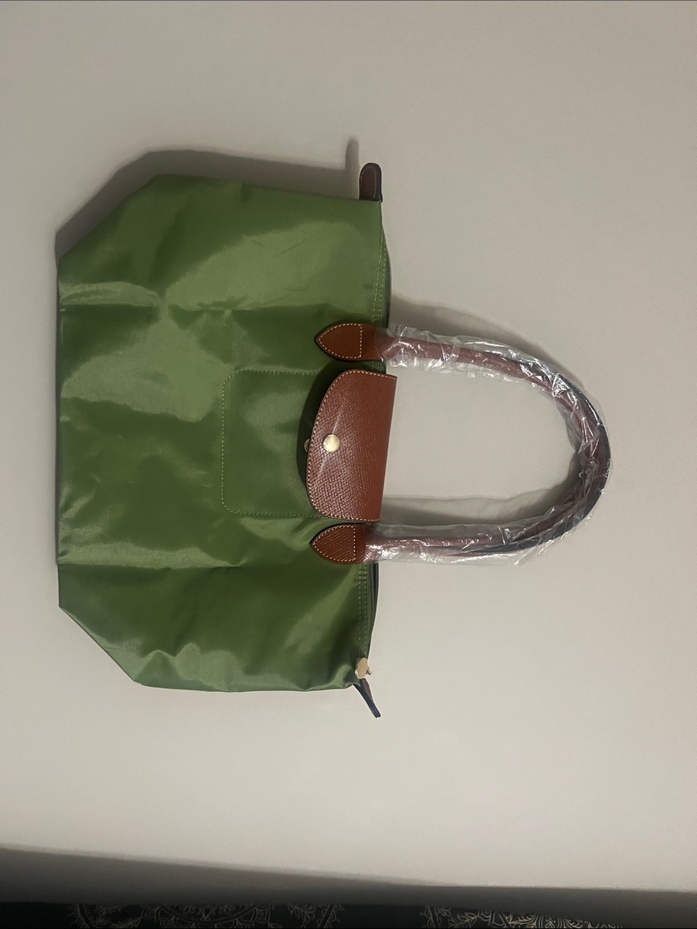 Green and brown tote bag
